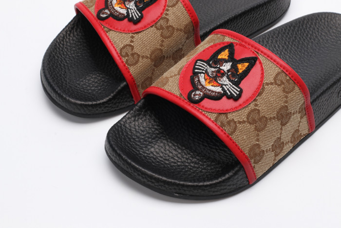 G*u*i slippers